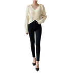 Women's loose fit knit sweater in Black back view