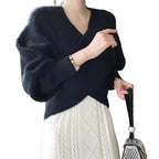 Side view of Black women's batwing sleeve sweater