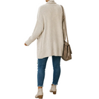 Side view of Cream women's bat sleeve cardigan