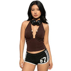 Close-up of lace-up halter neck detail on Dusty Pink tank top